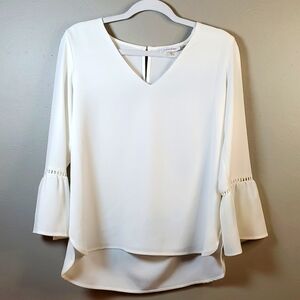 Calvin Klein cream, 3/4 length belled sleeves, blouse. Size small